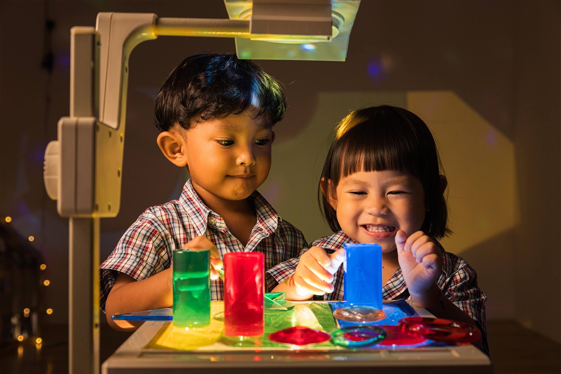 E-Bridge Pre-School students learning about light and colours