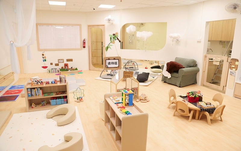 Spacious and well-equipped childcare classroom interior at E-Bridge Preschool.